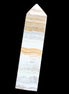 Grass Flower Calcite obelisk 649g in sunlight - Rocks and THings Store