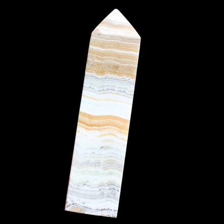 Grass Flower Calcite obelisk 649g in sunlight - Rocks and THings Store