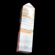 Grass Flower Calcite obelisk 649g in sunlight - Rocks and THings Store