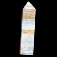 Grass Flower Calcite obelisk 649g in sunlight - Rocks and THings Store