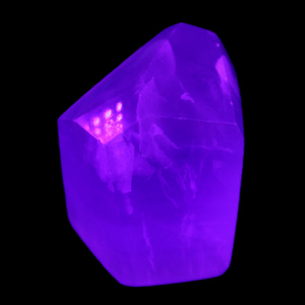 Purple Fluorite polygon 201g in UV light - Rocks and Things Store