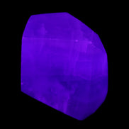 Purple Fluorite polygon 201g in UV light - Rocks and Things Store
