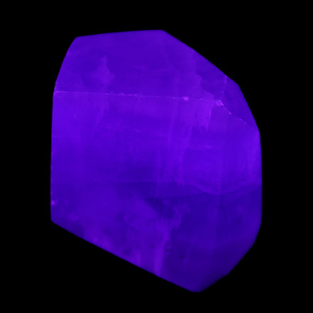 Purple Fluorite polygon 201g in UV light - Rocks and Things Store