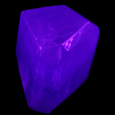 Purple Fluorite polygon 201g in UV light - Rocks and Things Store