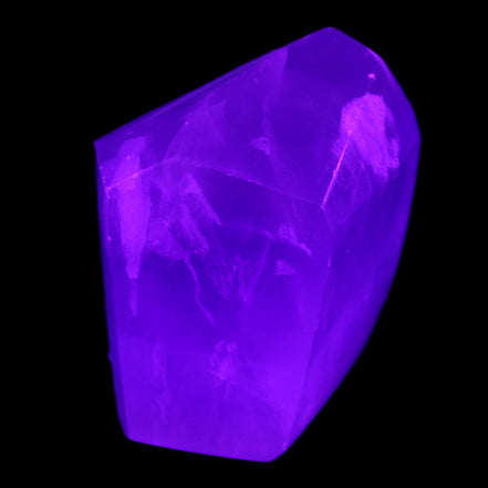 Purple Fluorite polygon 201g in UV light - Rocks and Things Store