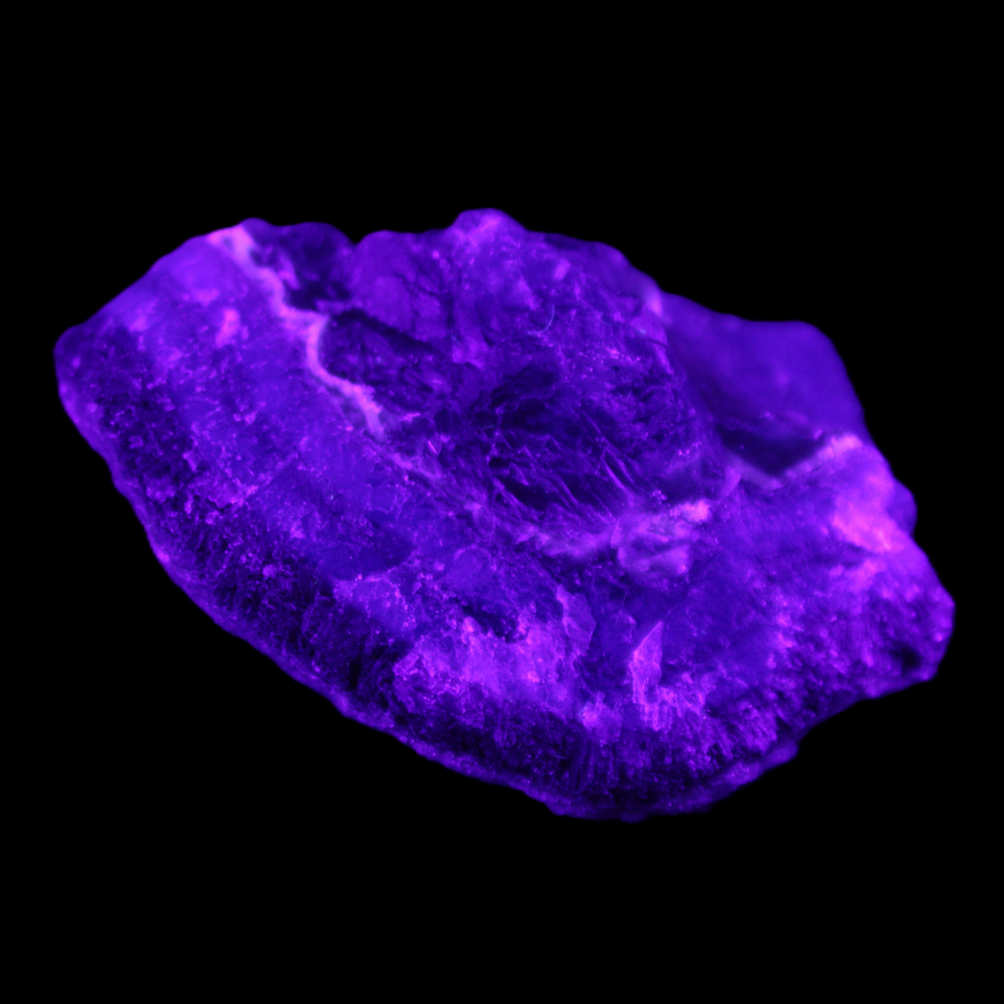 Dark Violet and Rainbow Fluorite geode section 55.9g in sunlight - Rocks and Things Store