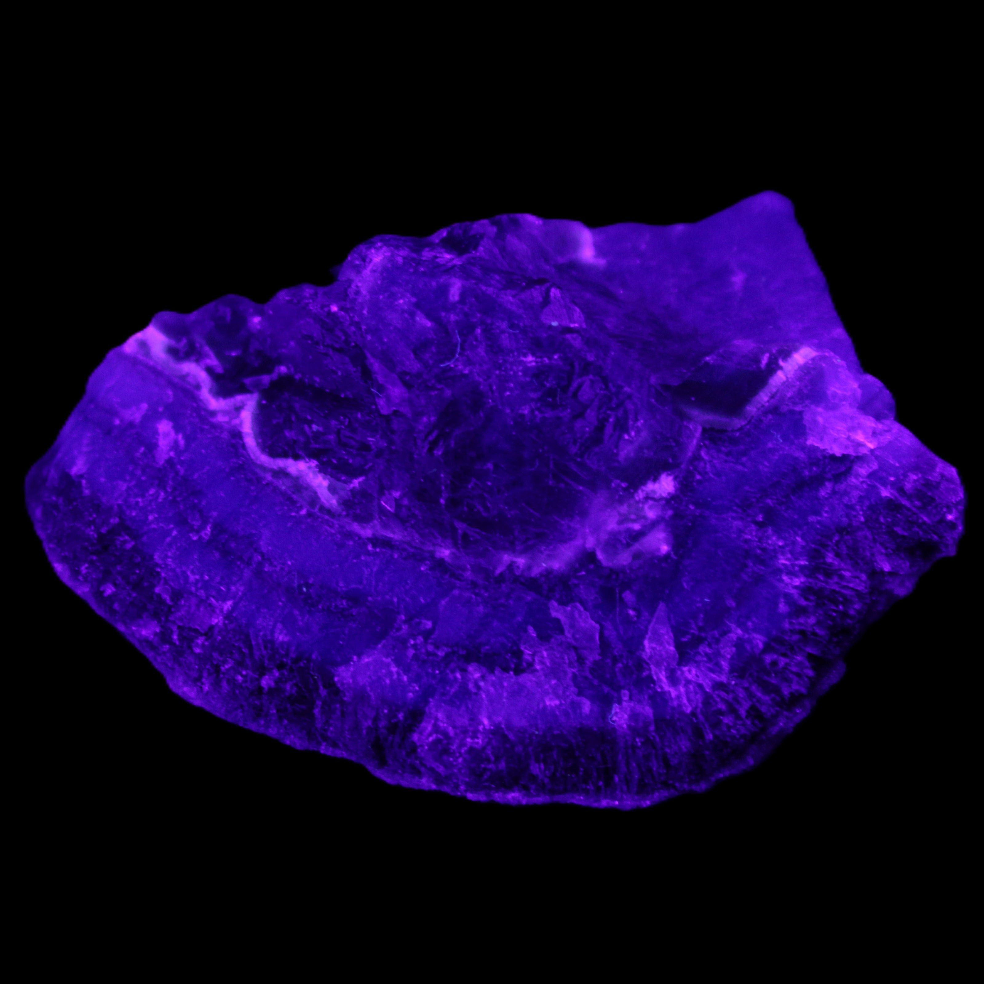 Dark Violet and Rainbow Fluorite geode section 55.9g in sunlight - Rocks and Things Store