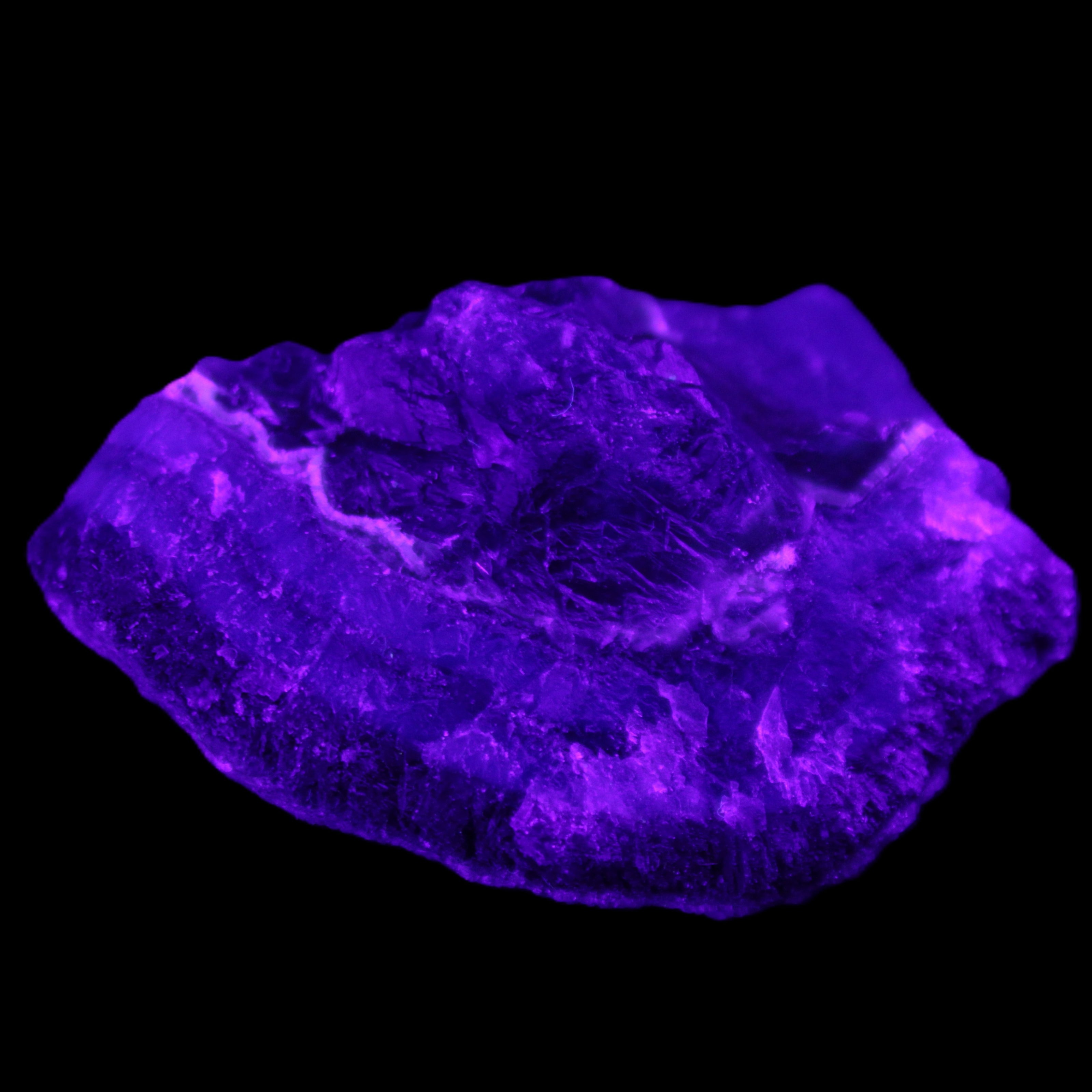 Dark Violet and Rainbow Fluorite geode section 55.9g in sunlight - Rocks and Things Store