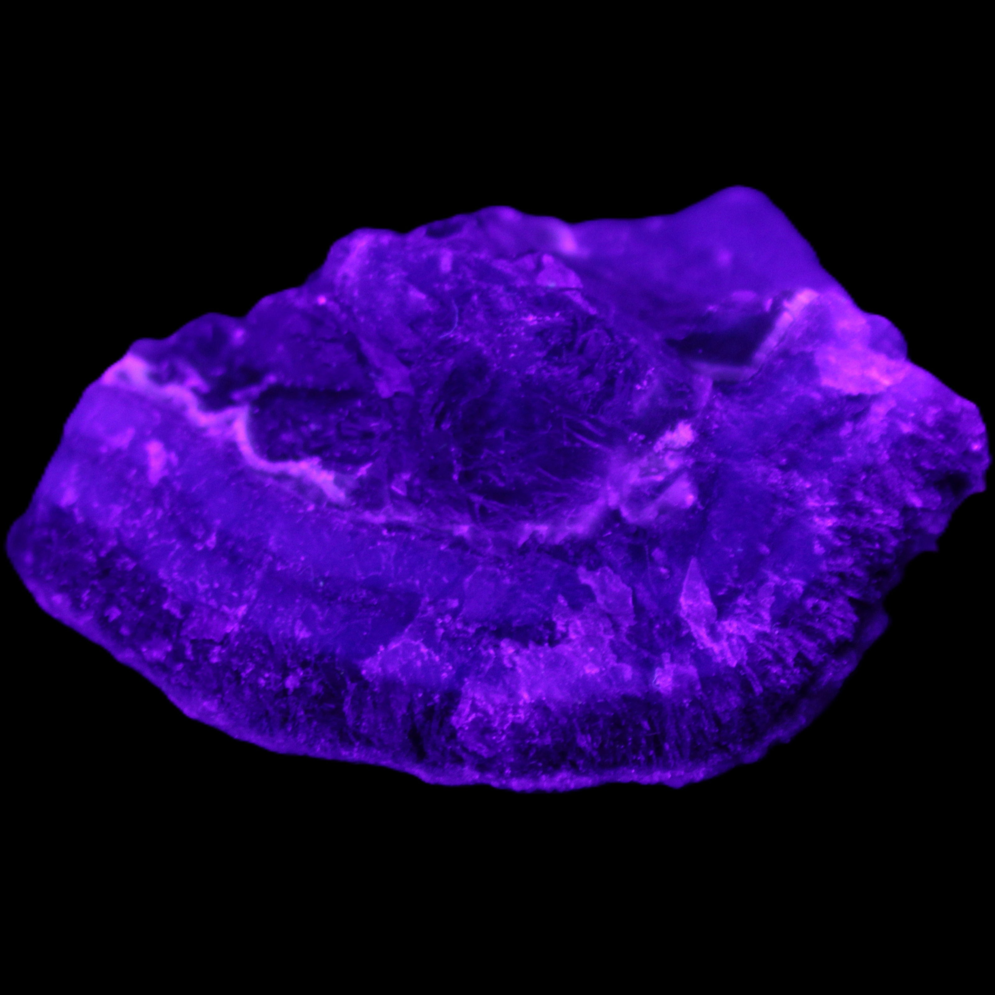 Dark Violet and Rainbow Fluorite geode section 55.9g in sunlight - Rocks and Things Store