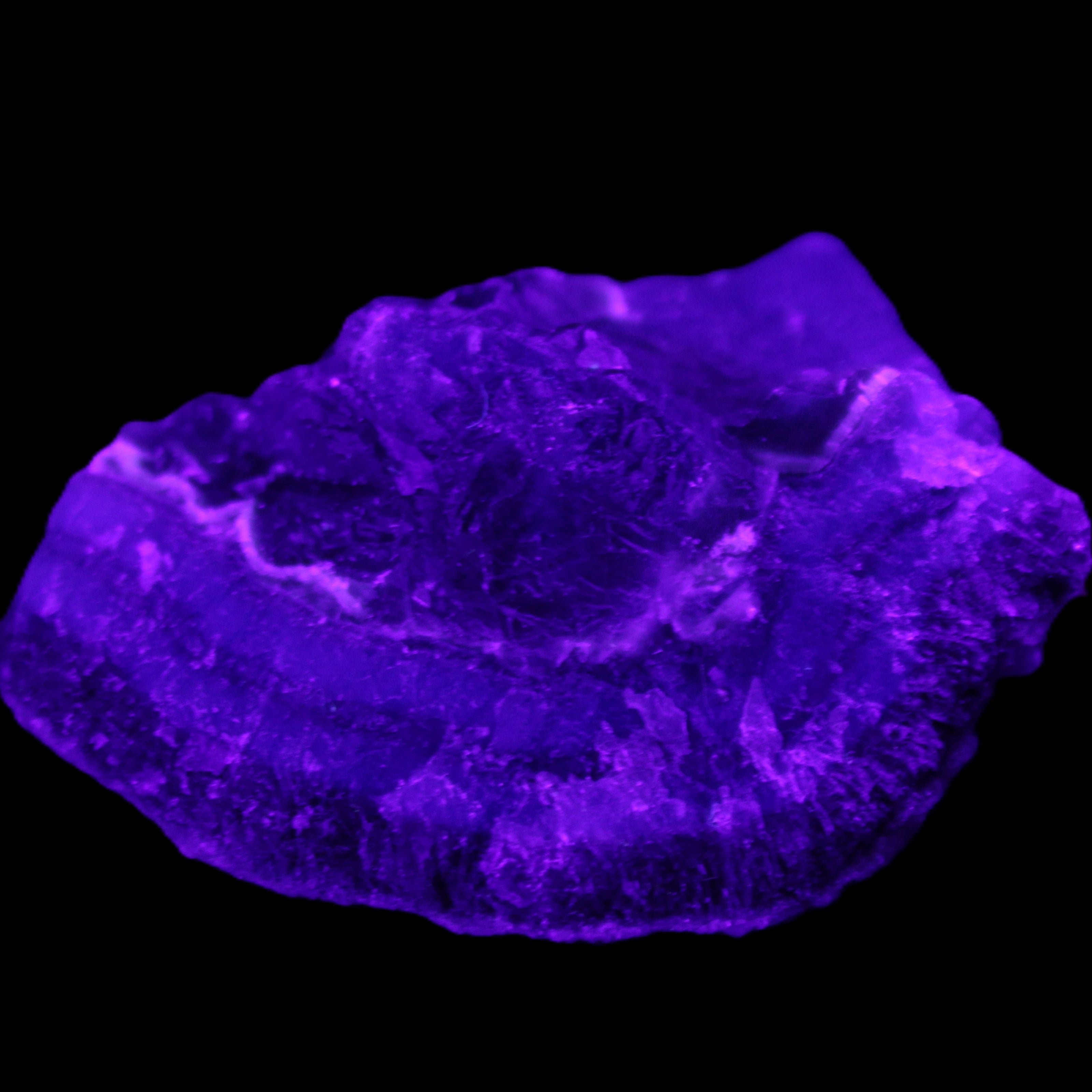 Dark Violet and Rainbow Fluorite geode section 55.9g in sunlight - Rocks and Things Store