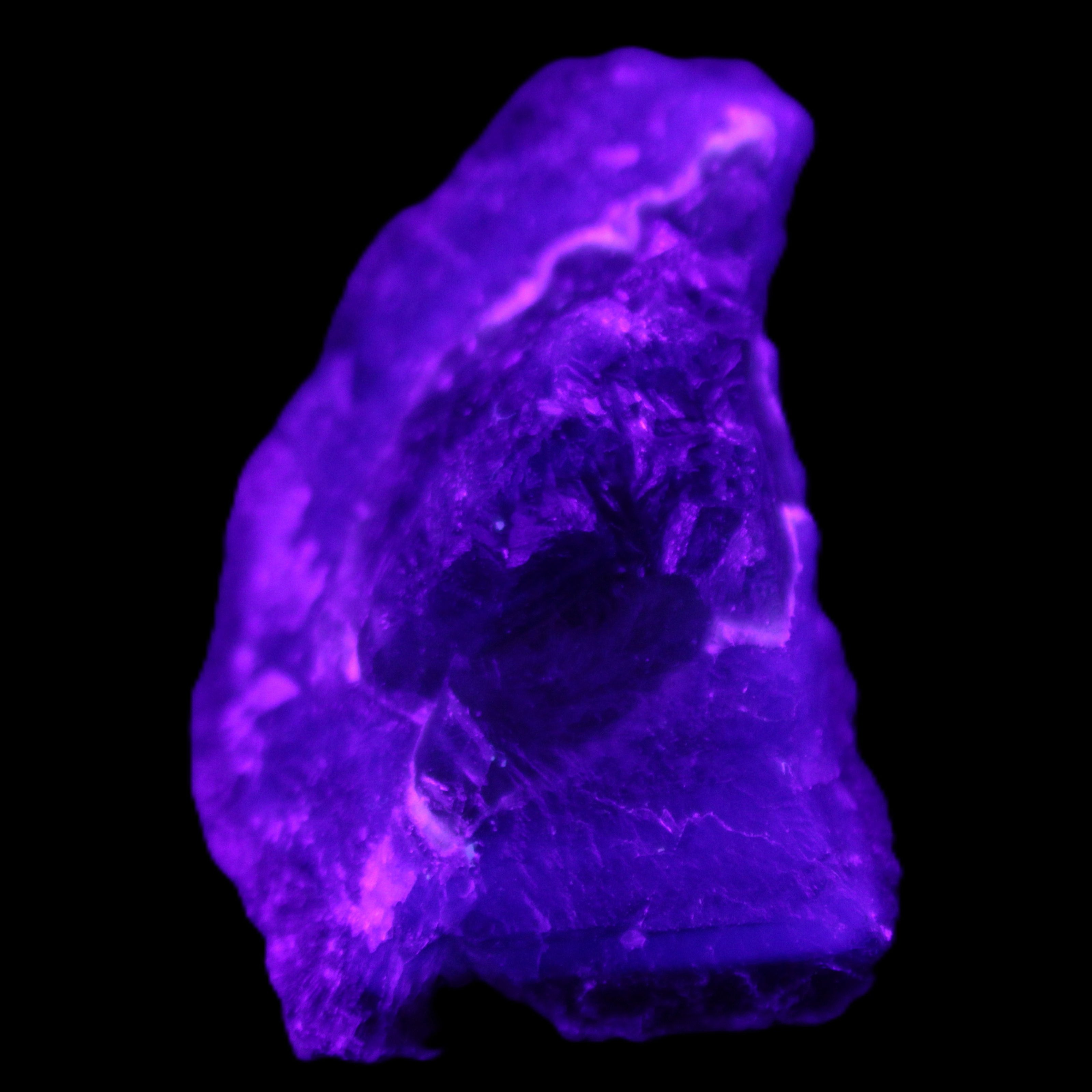 Dark Violet and Rainbow Fluorite geode section 55.9g in sunlight - Rocks and Things Store