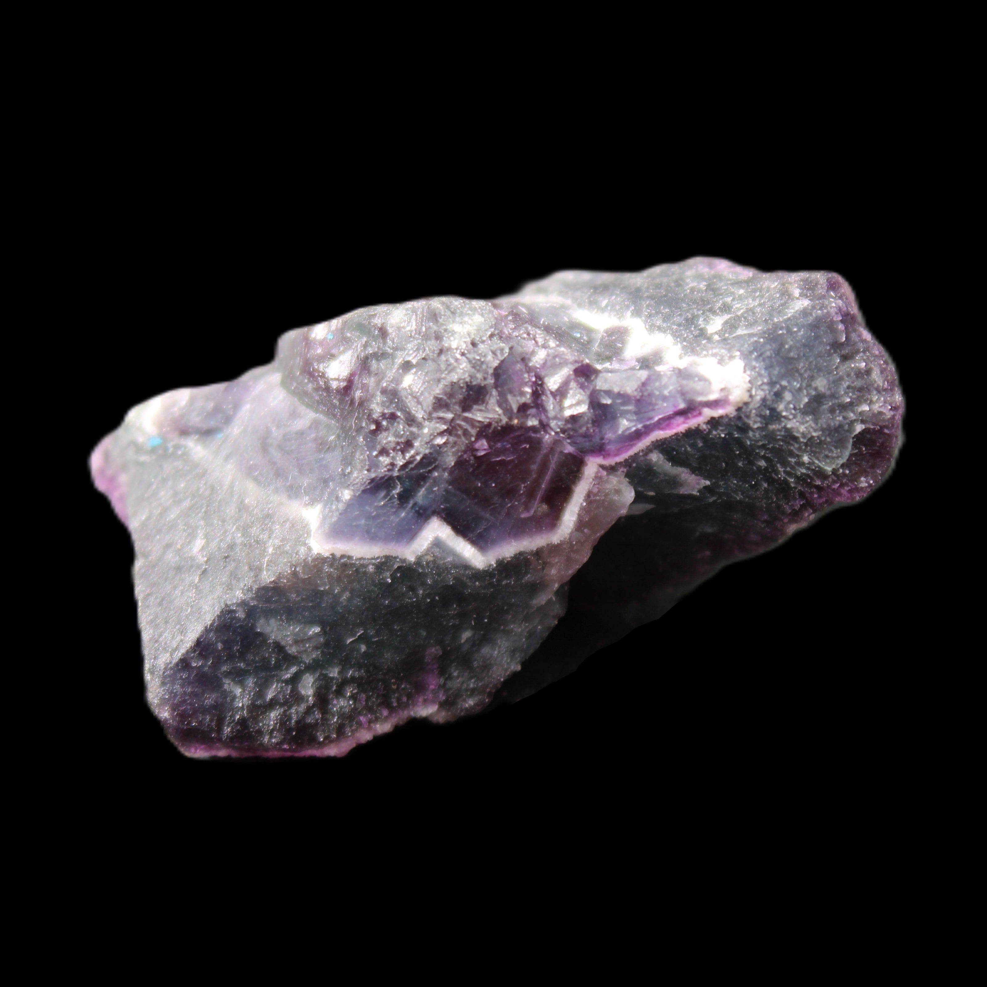 Dark Violet and Rainbow Fluorite geode section 55.9g in sunlight - Rocks and Things Store