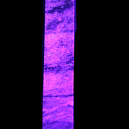 Purple Fluorite obelisk 515g in UV light