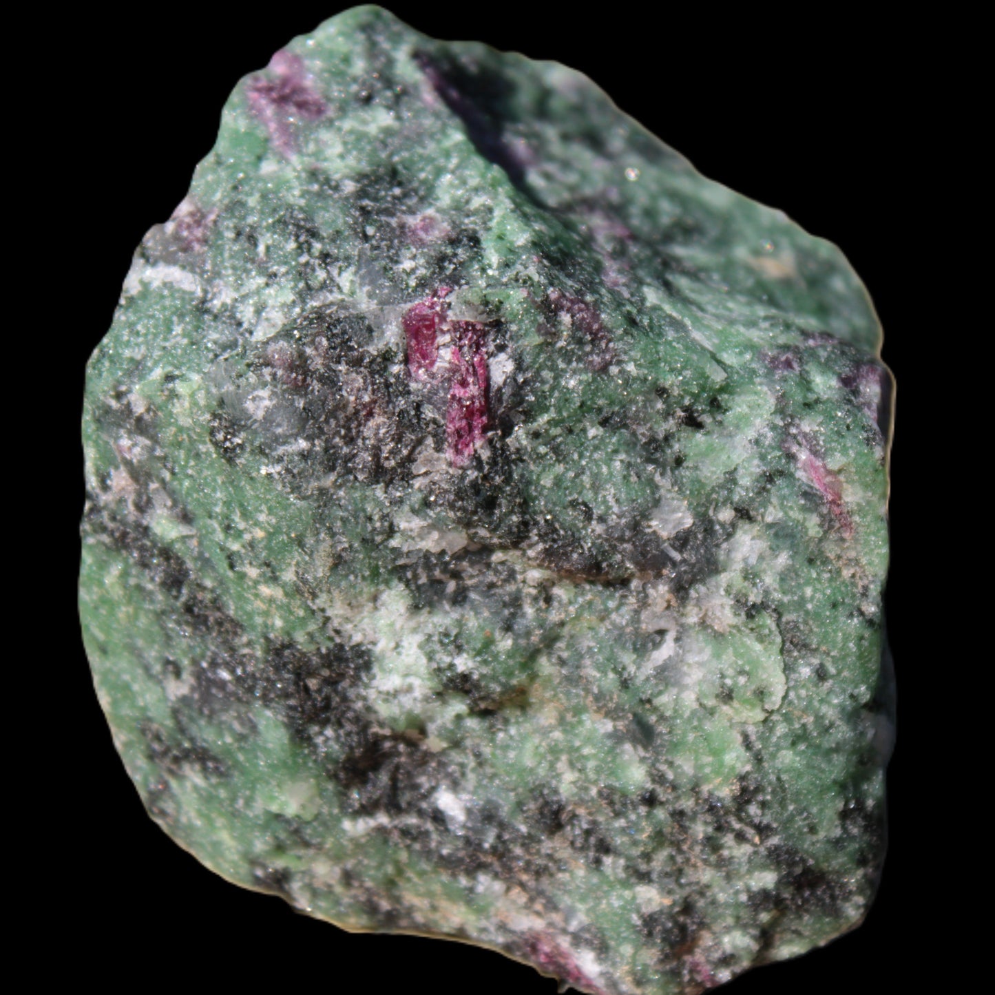 Ruby Zoisite 418g in sunlight