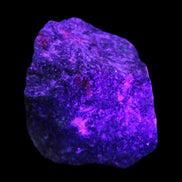Ruby Zoisite 418g in UV light, Rocks and Things Store