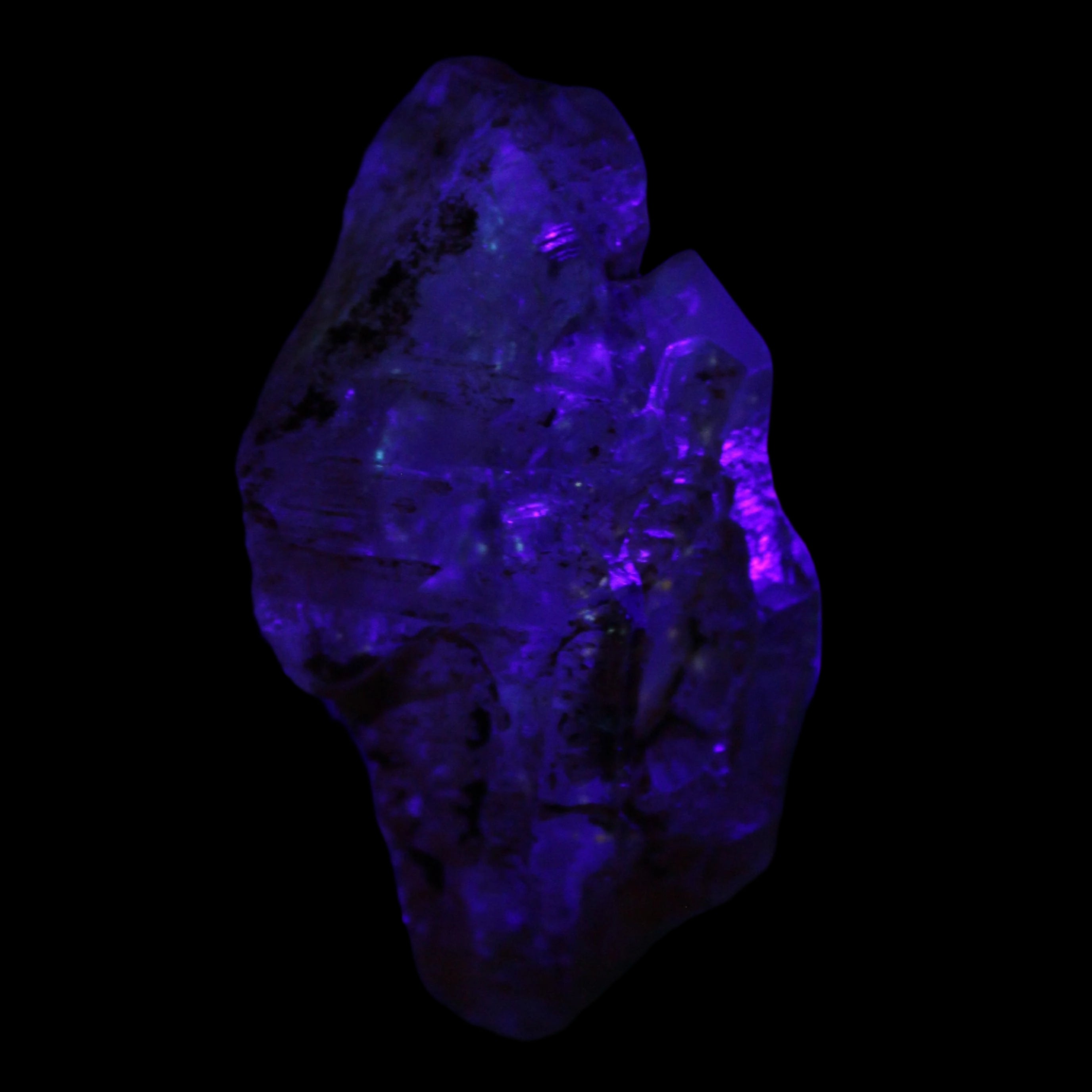 Fenster Diamond Quartz with petroleum fluorescence 54mm 30g in sunlight - Rocks and Things Store