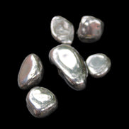 Hematite Terahertz 6-8 stones 10-11g in sunlight - Rocks and Things Store