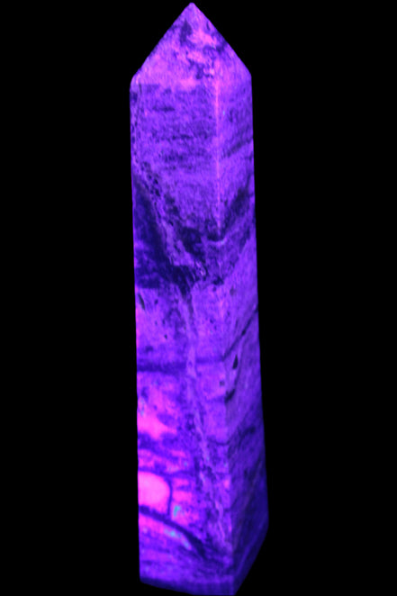 Purple Fluorite obelisk 715g in UV light - Rocks and Things Store