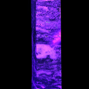 Purple Fluorite obelisk 715g in UV light - Rocks and Things Store