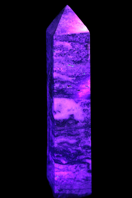 Purple Fluorite obelisk 715g in UV light - Rocks and Things Store