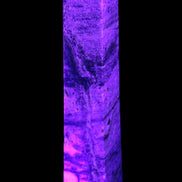 Purple Fluorite obelisk 715g in UV light - Rocks and Things Store