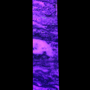 Purple Fluorite obelisk 715g in UV light - Rocks and Things Store