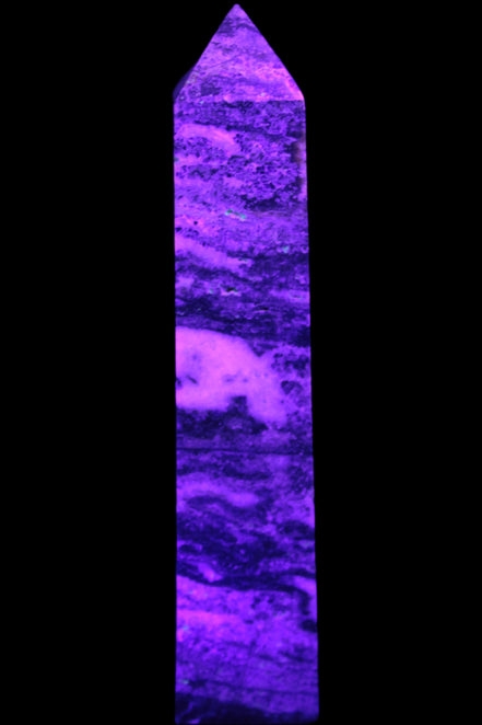 Purple Fluorite obelisk 715g in UV light - Rocks and Things Store