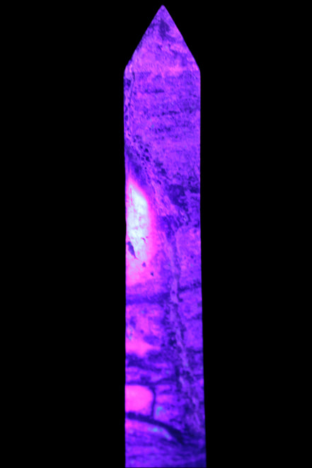 Purple Fluorite obelisk 715g in UV light - Rocks and Things Store