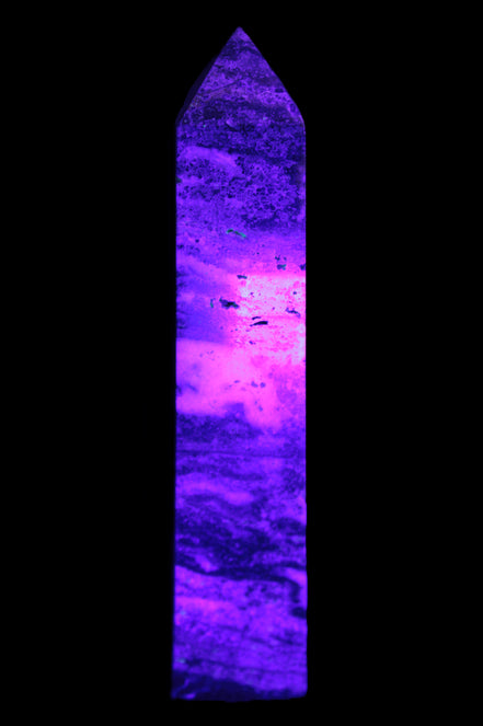 Purple Fluorite obelisk 715g in UV light - Rocks and Things Store