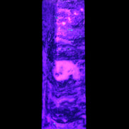 Purple Fluorite obelisk 715g in UV light - Rocks and Things Store