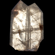 Clear Quartz double-pillar obelisk 1655g in dusk sunlight, held in hand