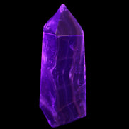 Dark Fluorite obelisk 180*76mm 1775g in UV light - Rocks and Things Store