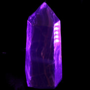Dark Fluorite obelisk 180*76mm 1775g in UV light - Rocks and Things Store