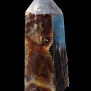 Dark Fluorite obelisk 180*76mm 1775g in sunlight - Rocks and Things Store