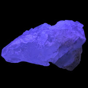 Clear Fluorite crystal 340g in UV light - Rocks and Things Store