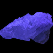 Clear Fluorite crystal 340g in UV light - Rocks and Things Store