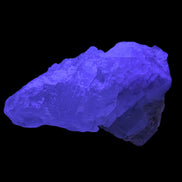 Clear Fluorite crystal 340g in UV light - Rocks and Things Store