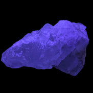Clear Fluorite crystal 340g in UV light - Rocks and Things Store