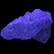 Clear Fluorite crystal 340g in UV light - Rocks and Things Store