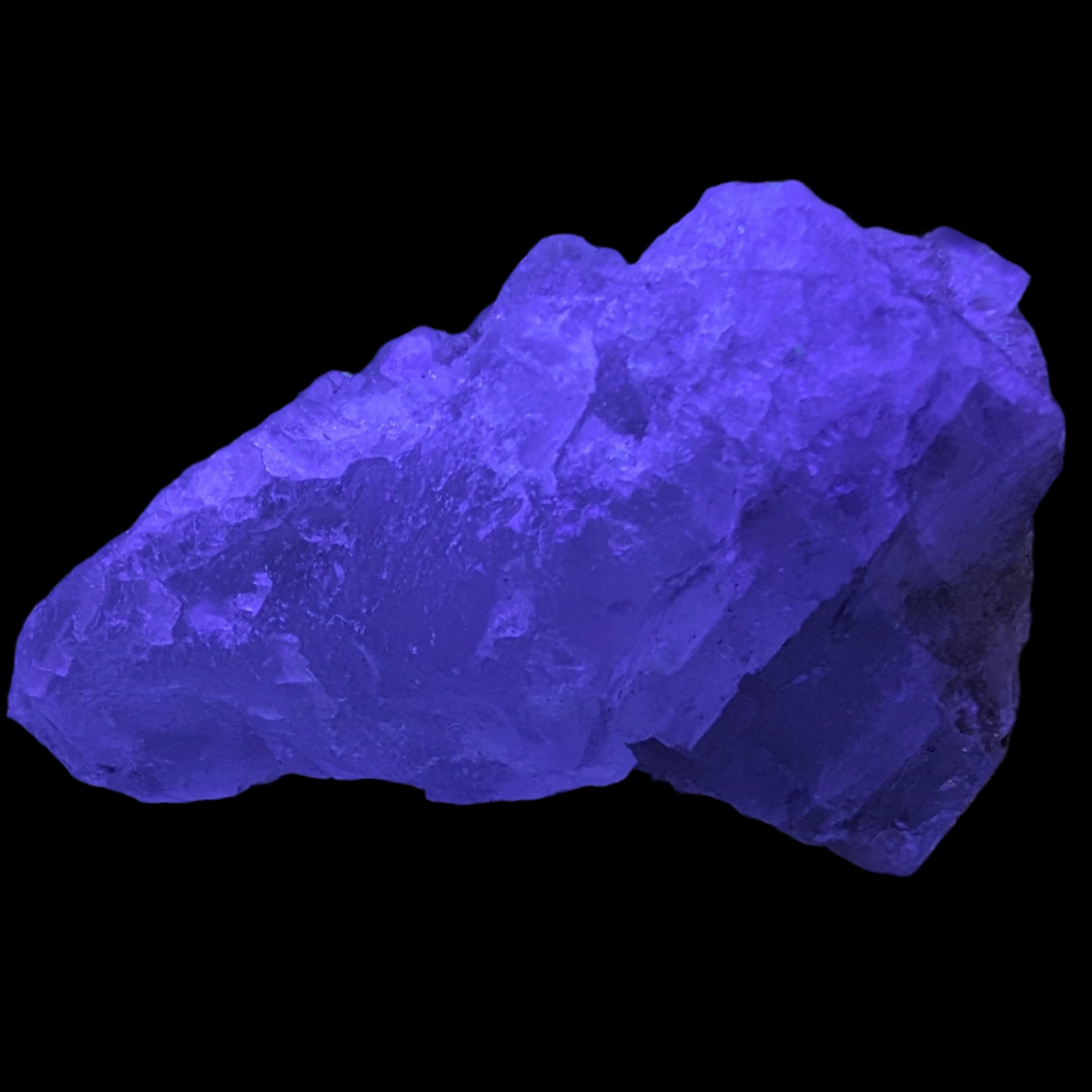 Clear Fluorite crystal 340g in UV light - Rocks and Things Store
