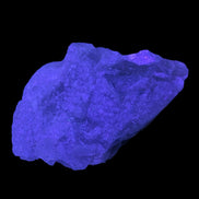 Clear Fluorite crystal 340g in UV light - Rocks and Things Store