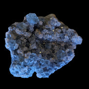 Fluorite green and yellow cubic crystal cluster 110g in LED & UV light - Rocks and Things Store