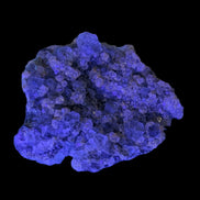 Fluorite green and yellow cubic crystal cluster 110g in UV light - Rocks and Things Store