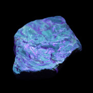 Blue Amber from Mozambique 1/2 pieces 37-40mm 14-20g in UV light - Rocks and Things Store