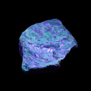 Blue Amber from Mozambique 1/2 pieces 37-40mm 14-20g in UV light - Rocks and Things Store