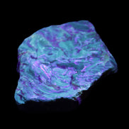 Blue Amber from Mozambique 14g in UV light - Rocks and Things Store