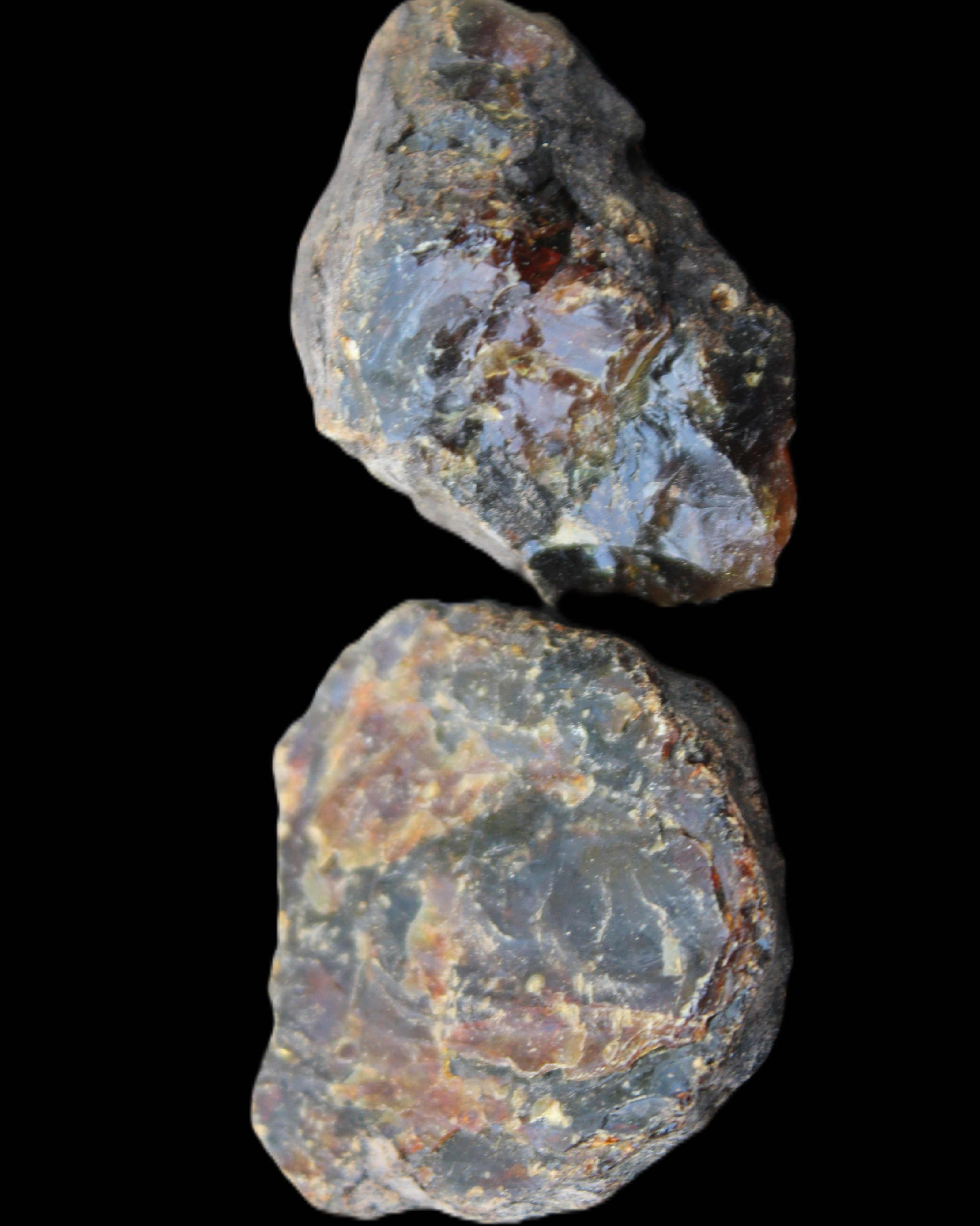 Blue Amber from Mozambique 1/2 pieces 37-40mm 14-20g in sunlight - Rocks and Things Store