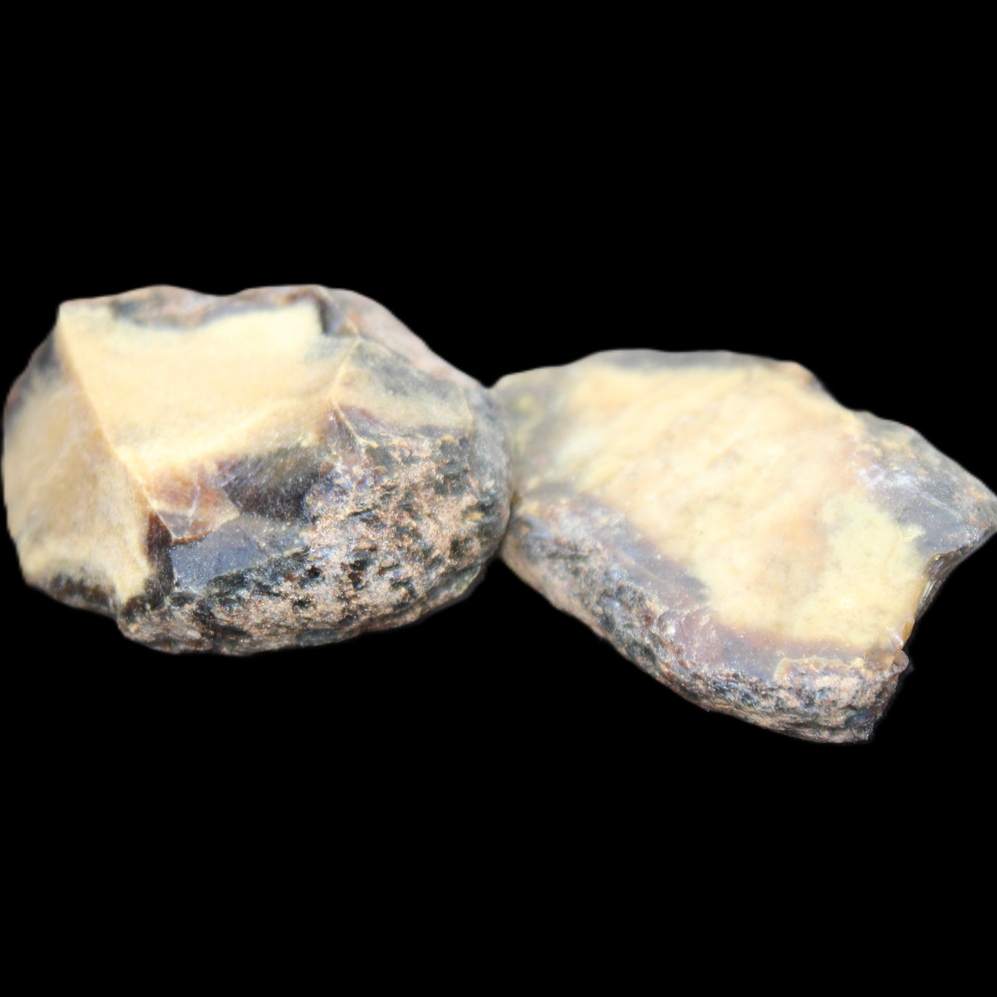 Blue Amber from Mozambique 1/2 pieces 37-40mm 14-20g in sunlight - Rocks and Things Store