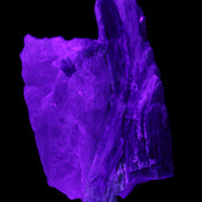 Kyanite blade cluster on Quartz 102*56*42mm 265g in UV light - Rocks and Things Store