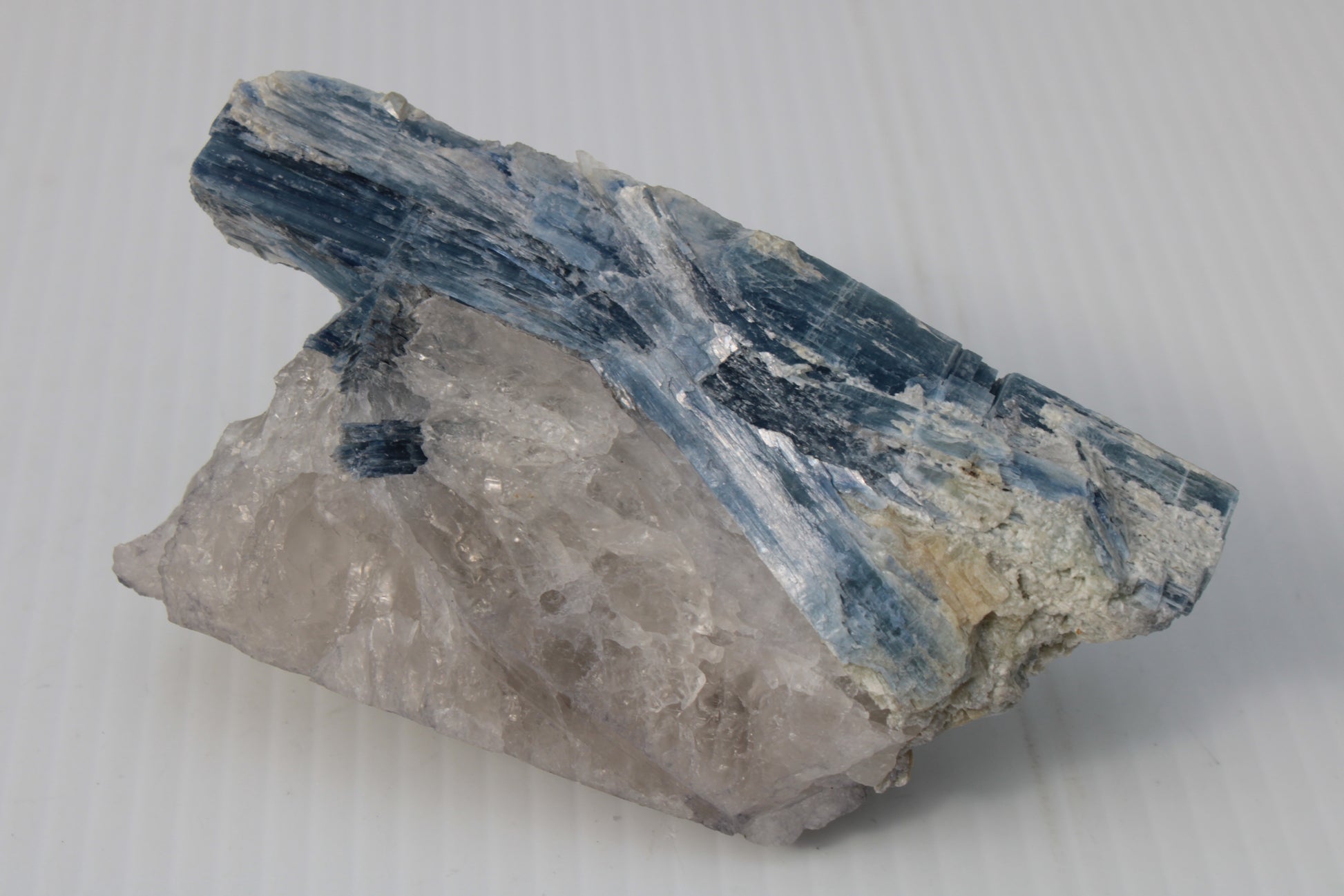 Kyanite blade cluster on clear Quartz 315g Rocks and Things